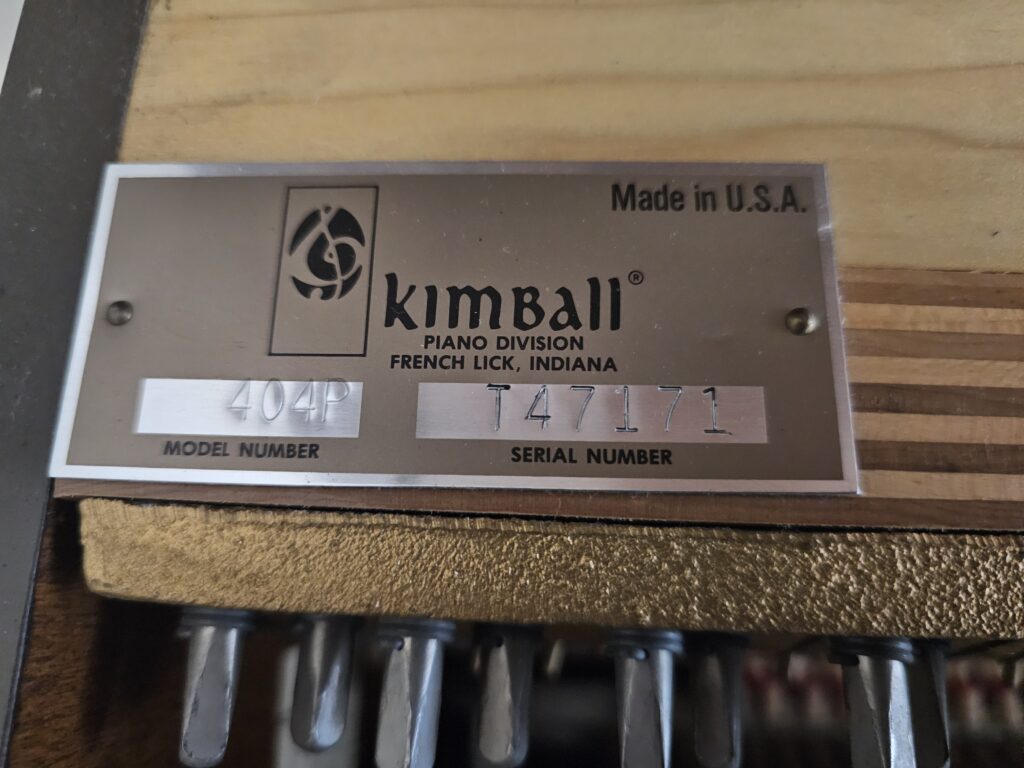 Close up of the serial number on a Kimball studio piano.