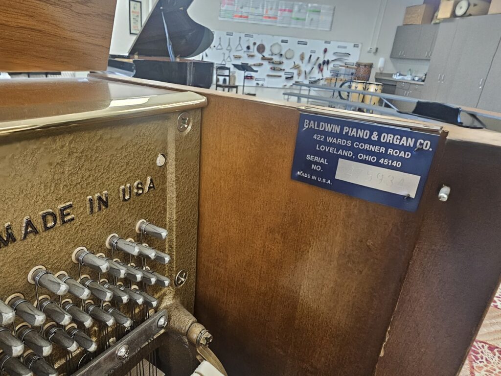 Close up of the serial number on a Baldwin upright piano.