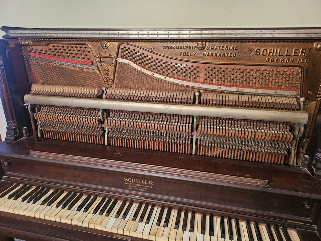 Schiller upright with front panel removed.