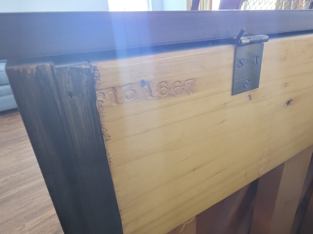 The serial number shown on the back of a Henry F. Miller spinet.