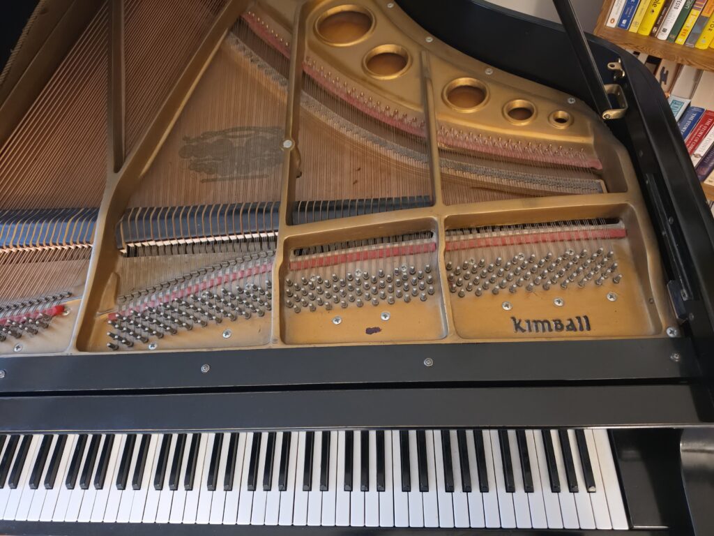 Kimball grand with the lid open and music rack removed.