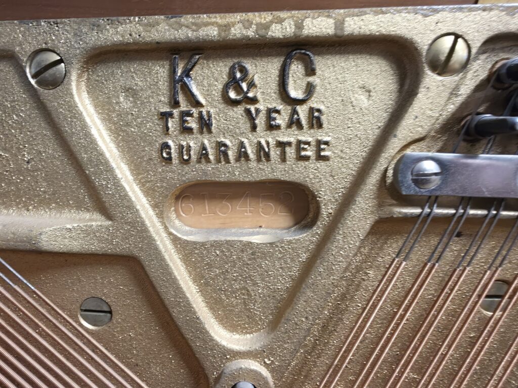 This is a close-up of the serial # on a Kohler & Campbell spinet piano.