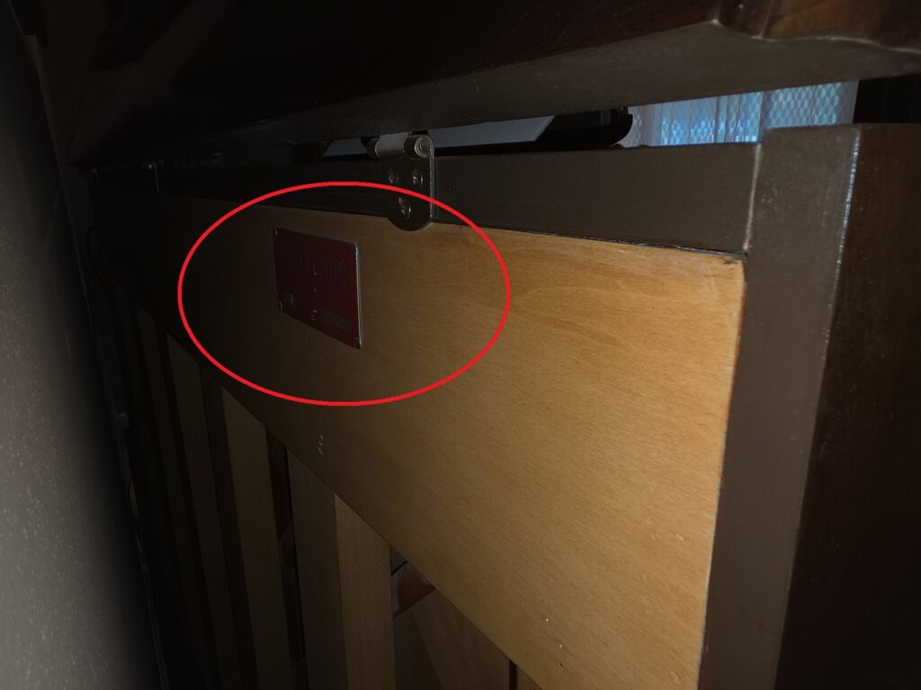 The back of a modern Chickering upright, showing the serial number plaque.